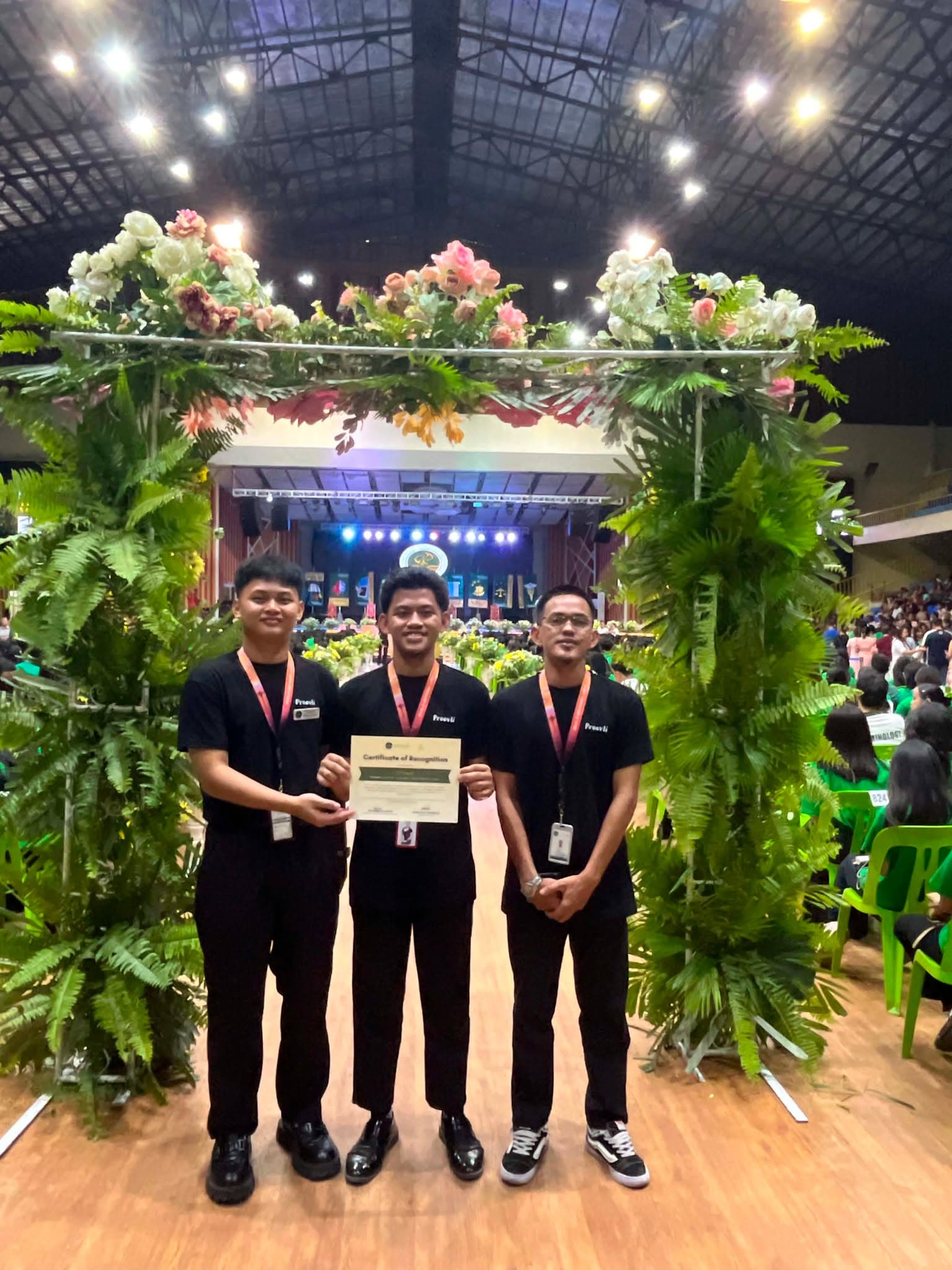 The Proovli team posing together with the certificate of recognition at the event venue.
